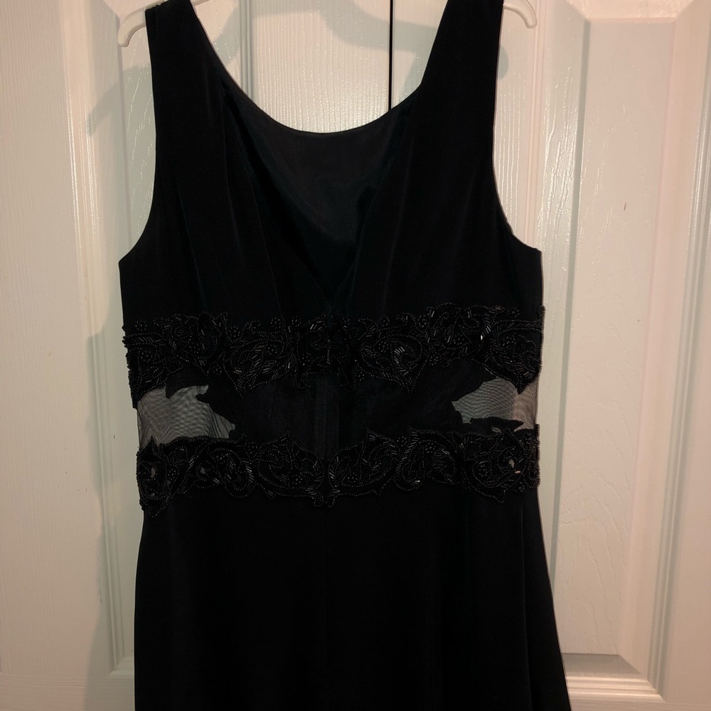 Black silky dress. Very cute and never worn